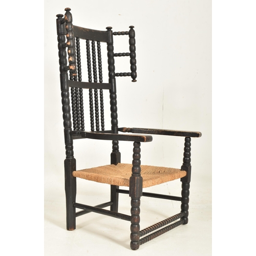 406 - An Arts & Crafts late 19th / early 20th century circa 1900 ebonised bobbin turned armchair. The ... 