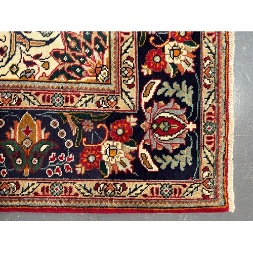 416 - A large early 20th century North West Persian Islamic Tabirz floor carpet rug. The carpet having a c... 