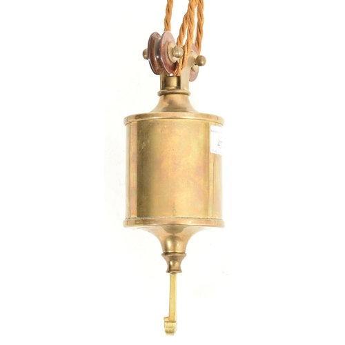 417 - An early 20th century brass & rope counterweight billiard's ceiling light lamp. The light having... 