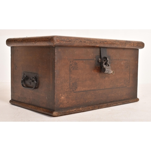 421 - An 18th century oak and ebony stencil decoration bible box - casket chest. The chest having a rectan... 