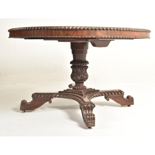 436 - A William IV 19th century mahogany circular loo breakfast table. The table having a circular top wit... 