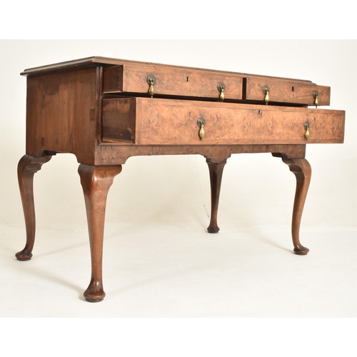 441 - A Queen Anne 18th century walnut veneered lowboy writing table desk. The desk having a crossbanded c... 