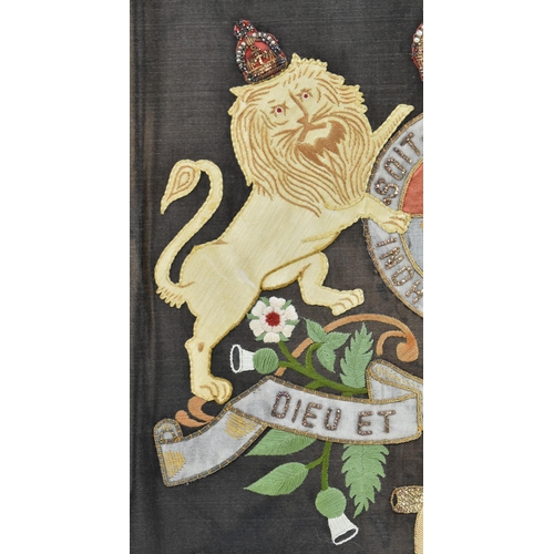 447 - A 19th century artillery regiment Royal coat of arms in applique and embroidery work. The embroidery... 