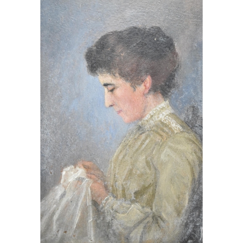 453 - A believed French early 20th century pastel & oil on cardboard portrait painting of a lady sewin... 