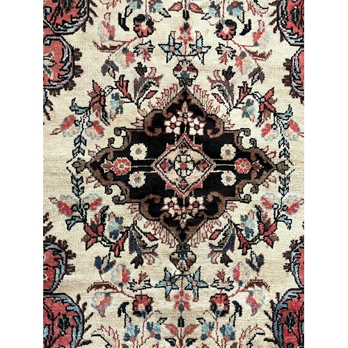 461 - A 20th century North West Persian Islamic Mahal floor carpet rug. The rug having a central cream &am... 