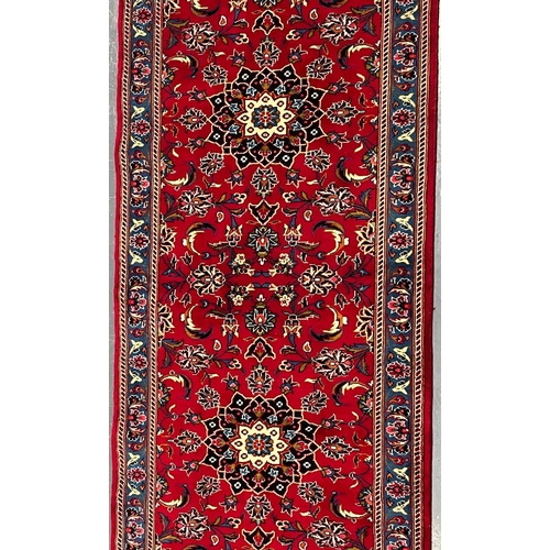 476 - A large early 20th century Central Persian Islamic Kashan floor carpet runner rug. The runner rug ha... 