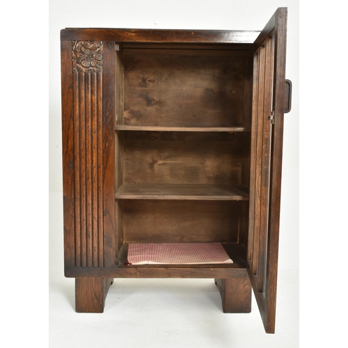 479 - An Art Deco early 20th century circa 1930s oak wood bookcase display cabinet. The cabinet having a r... 