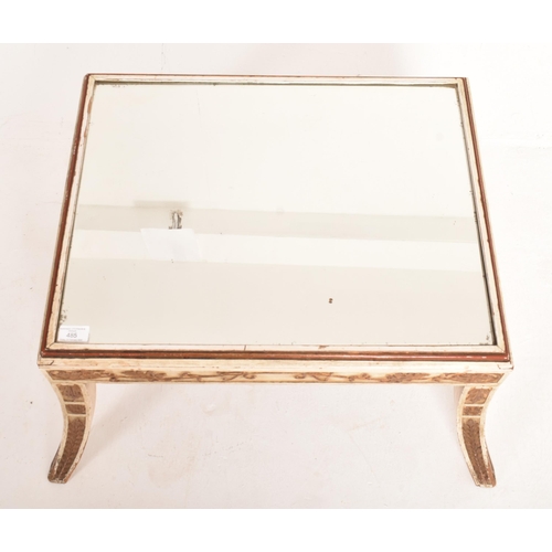 485 - A French Empire inspired gilt & white painted mirrored top side occasional low table. The table ... 