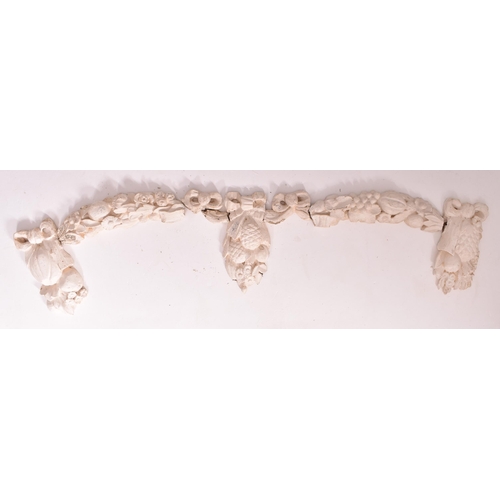 490 - A set of late 18th century carved oak & gesso wall swag embellishments in eight sections. The wa... 