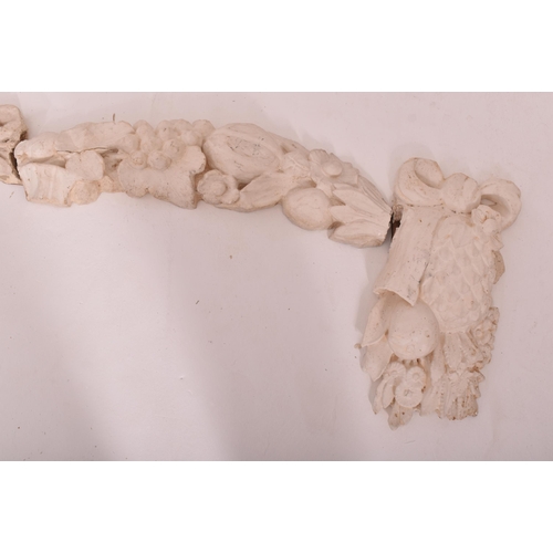 490 - A set of late 18th century carved oak & gesso wall swag embellishments in eight sections. The wa... 