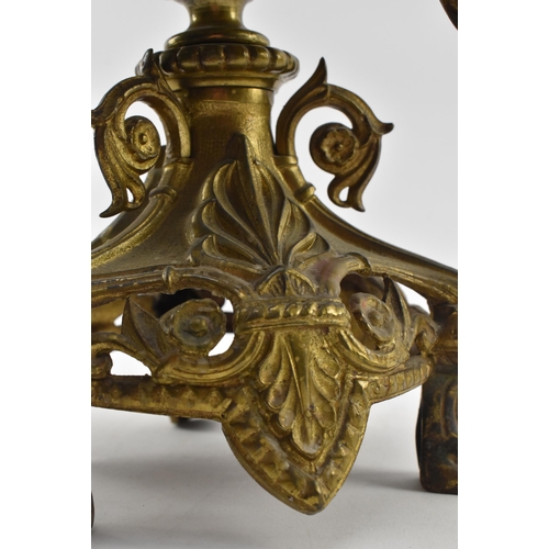 493 - A large 19th century French Empire toleware gilt metal candelabra. The centrepiece featuring floral ... 