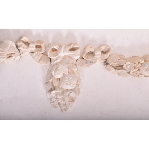 505 - A set of late 18th century carved oak & gesso wall swag embellishments in seven sections. The wa... 