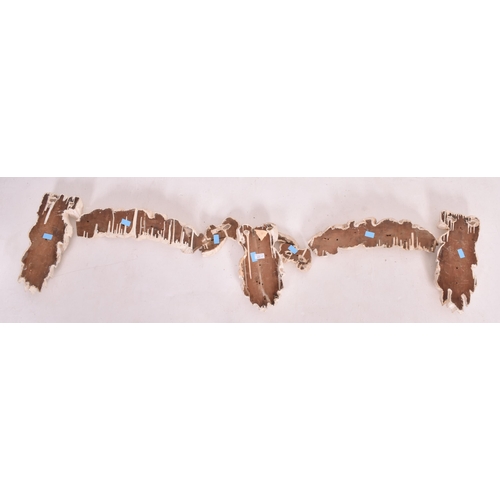 505 - A set of late 18th century carved oak & gesso wall swag embellishments in seven sections. The wa... 