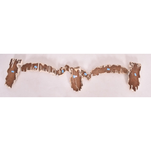 505 - A set of late 18th century carved oak & gesso wall swag embellishments in seven sections. The wa... 