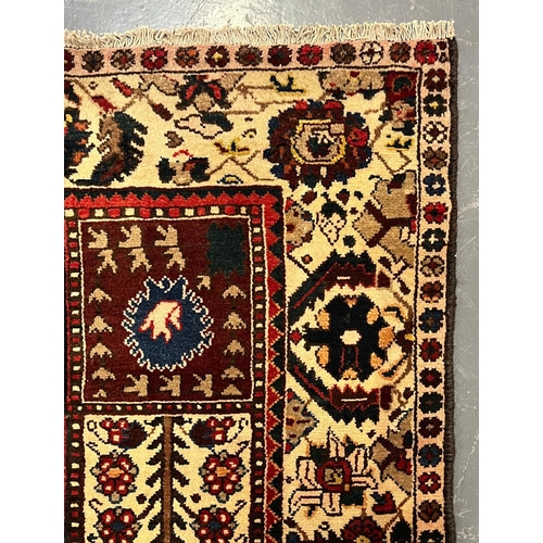 518 - An early 20th century Central Persian Islamic Bakhtiar floor carpet rug. The rug having a central pa... 