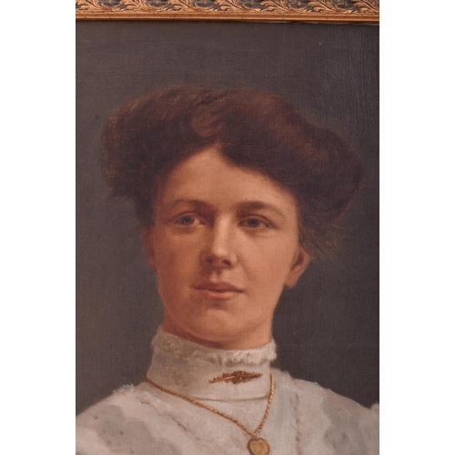 528 - An early 20th century oil on canvas portrait study of lady. The unfinished portrait painting depicti... 