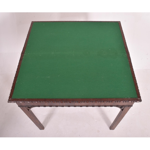 536 - A Chinese Chippendale manner 19th century mahogany fold top games / card table. The table having a r... 