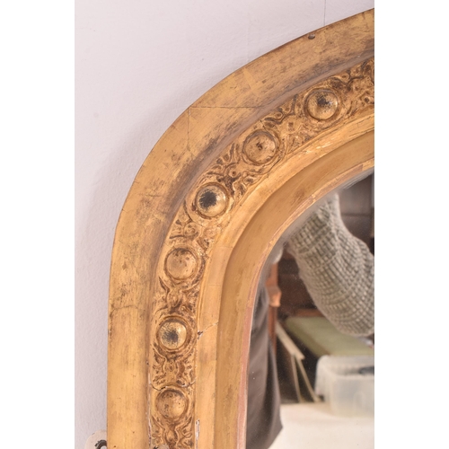 539 - A large Victorian 19th century giltwood and gesso overmantel wall mirror. The mirror having an intri... 