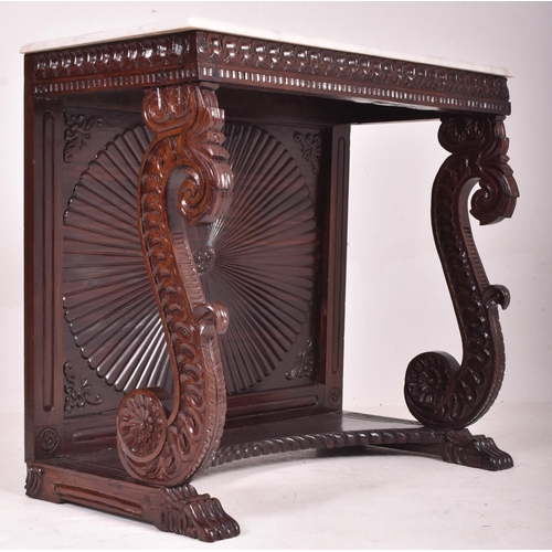 544 - An Anglo - Indian inspired carved hardwood & marble console hall table with marble top in the ma... 