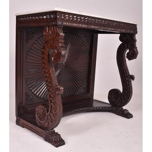 544 - An Anglo - Indian inspired carved hardwood & marble console hall table with marble top in the ma... 