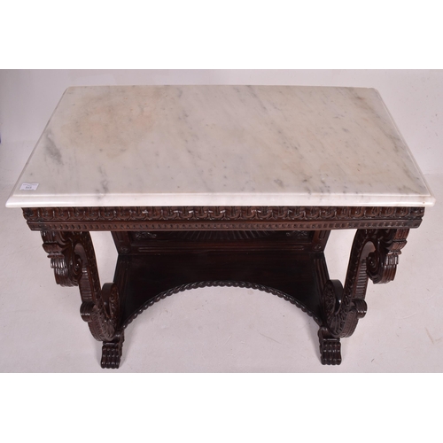 544 - An Anglo - Indian inspired carved hardwood & marble console hall table with marble top in the ma... 