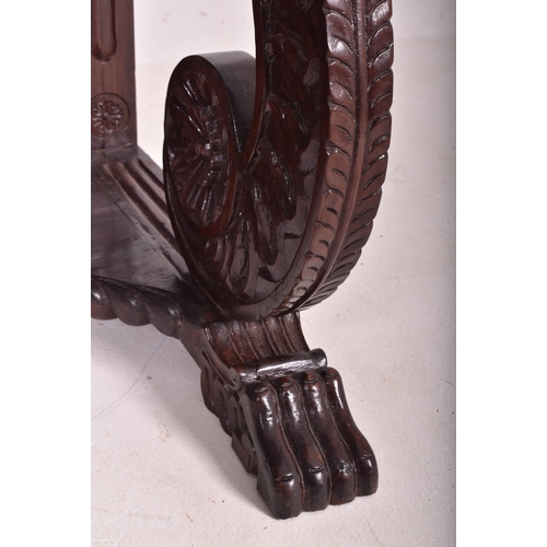 544 - An Anglo - Indian inspired carved hardwood & marble console hall table with marble top in the ma... 