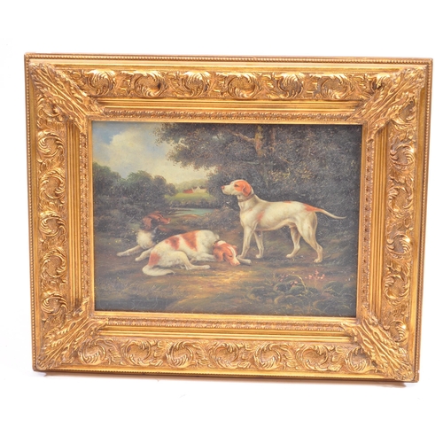 282 - A British School 19th century oil on board hunting scene painting. The painting depicting two recumb... 