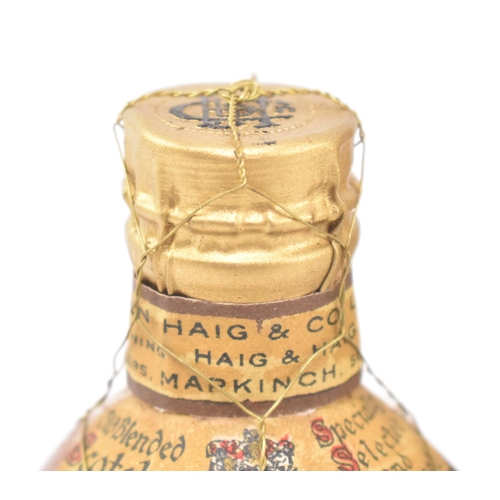 26 - John Haig & Co Ltd - Dimple Old Blended Scotch Whisky - a mid-century miniature Dimple whisky bo... 