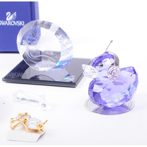 100 - Swarovski - A collection of vintage 20th century Swarovski cut crystal ornaments. The collection to ... 