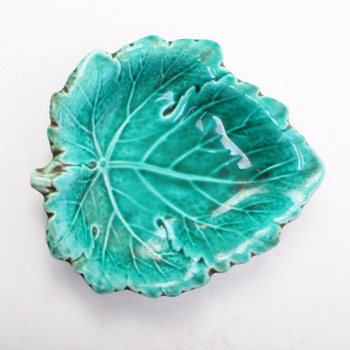 103 - Wedgwood - Three mid century ceramic majolica leaf plates with a green glaze. Makers mark to the und... 