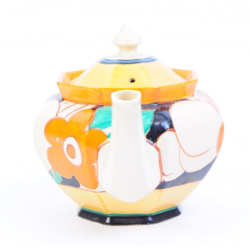 107 - Clarice Cliff - An early 20th century 1930s Clarice Cliff Fantasque teapot. The teapot cream ground ... 