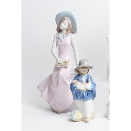 11 - Lladro, Nao - Collection of hand made Spanish porcelain figurines. To include a large Bride in a wed... 