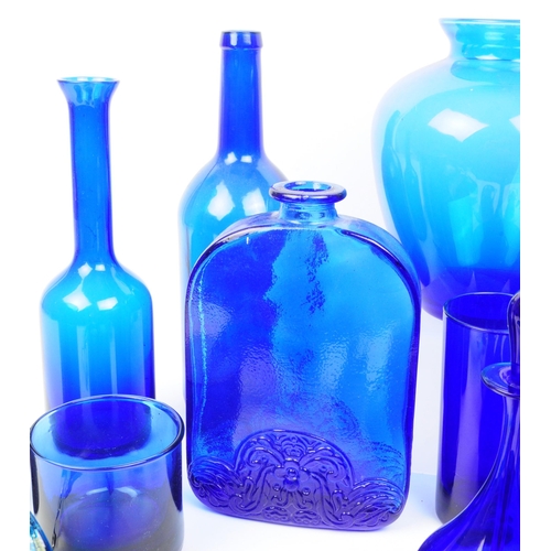 122 - A collection of vintage 20th century blue glass items. Some Bristol examples, some items including b... 