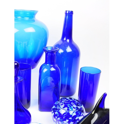 122 - A collection of vintage 20th century blue glass items. Some Bristol examples, some items including b... 