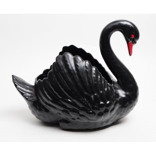 146 - Dartmouth Pottery - A vintage 20th century ceramic black swan planter / posy vase. Havign a red beak... 