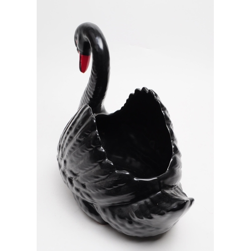 146 - Dartmouth Pottery - A vintage 20th century ceramic black swan planter / posy vase. Havign a red beak... 