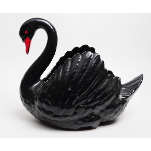 146 - Dartmouth Pottery - A vintage 20th century ceramic black swan planter / posy vase. Havign a red beak... 