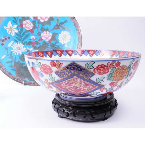 151 - A 20th century cloisonne charger with mudmen figure and imari bowl. Charger decorated in floral imag... 