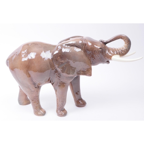 156 - Mid century Sylvac Elephant elephant figure. Numbered 68 to the underside. Measuring approx. 22.5cm ... 