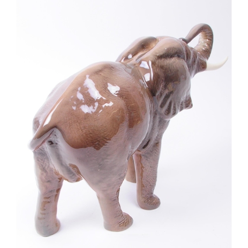 156 - Mid century Sylvac Elephant elephant figure. Numbered 68 to the underside. Measuring approx. 22.5cm ... 