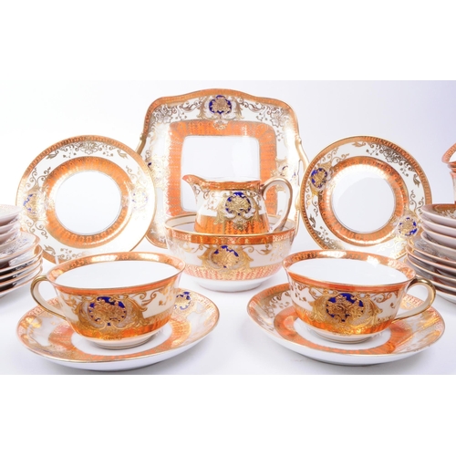 159 - Noritake - Early 20th century Japanese porcelain tea service in orange and gilt detailing. Makers ma... 