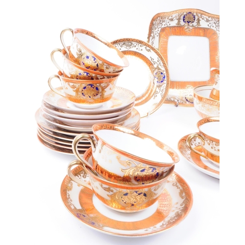 159 - Noritake - Early 20th century Japanese porcelain tea service in orange and gilt detailing. Makers ma... 