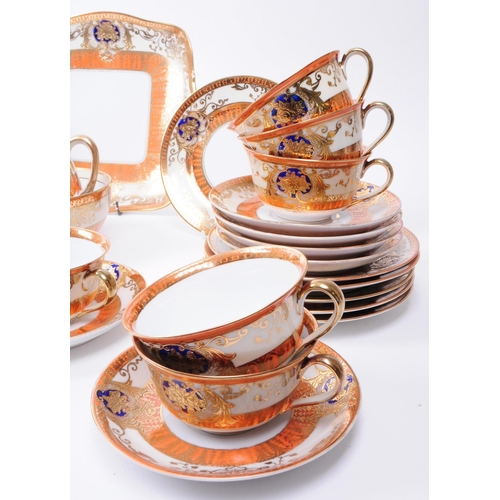 159 - Noritake - Early 20th century Japanese porcelain tea service in orange and gilt detailing. Makers ma... 