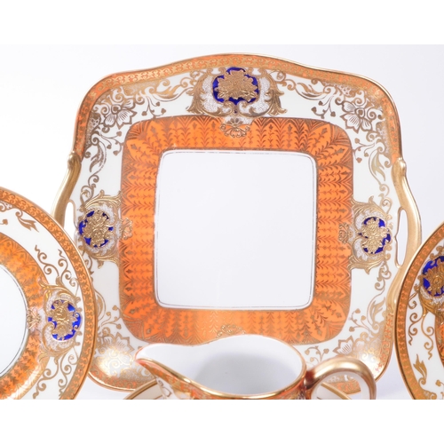 159 - Noritake - Early 20th century Japanese porcelain tea service in orange and gilt detailing. Makers ma... 