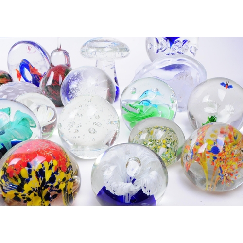 167 - Large collection of late 20th century glass paperweights. Including various sizes and shapes such as... 