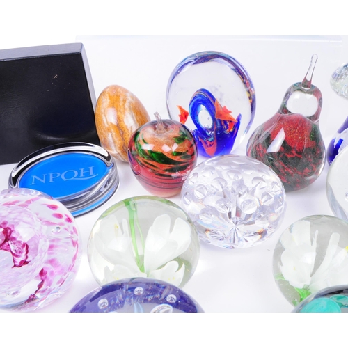 167 - Large collection of late 20th century glass paperweights. Including various sizes and shapes such as... 