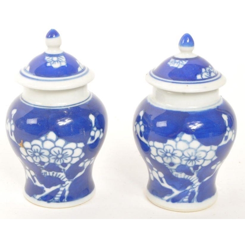 174 - Two small 20th Century Chinese blue and white ceramic ginger jars with prunus blossom decoration and... 