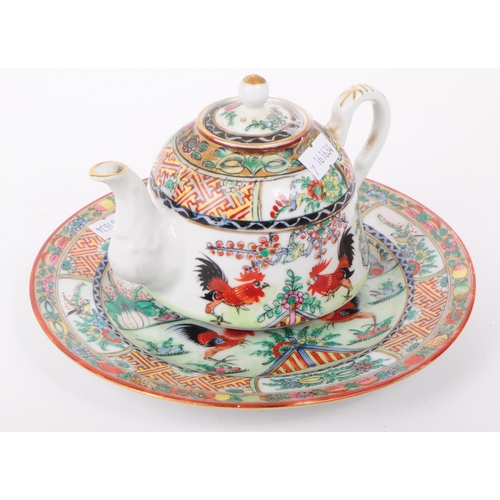 176 - A 1920s Chinese porcelain tea pot and plate, both decorated in hand painted cockerels, floral imager... 