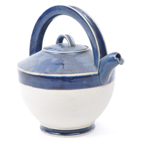 193 - C King - Three late 20th century studio pottery teapots comprised of two stoneware style teapots wit... 