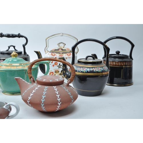 194 - A Large collection of 19th and 20th century ceramica and porcelain teapots to include Aesthetic Move... 